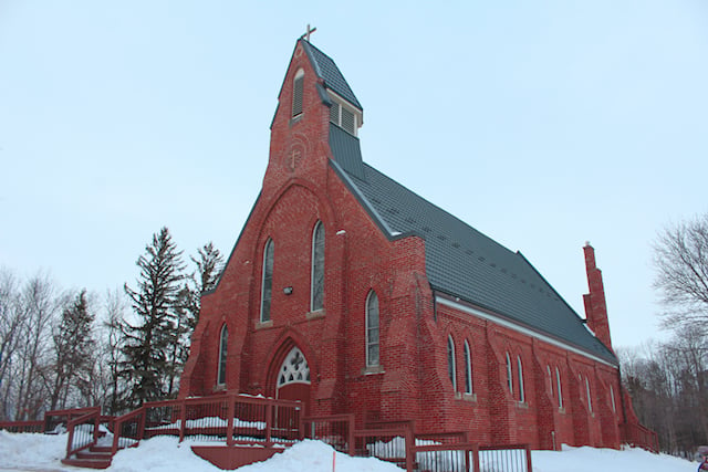 A historic red brick church in Caledon, St. Cornelius